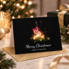 Bright Tree Christmas Cards Folded on a table with a gold envelope