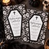 Bones and Casket Halloween invitations styled with candles and a skull