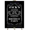 Whiskey Daniels Birthday Party Welcome Sign on a timber easel