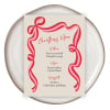 Ribbon Christmas menu in the pink colourway on a stoneware plate