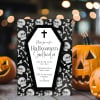 Coffin Halloween invitation styled with carved pumpkins